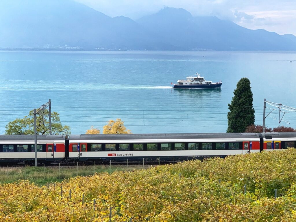 train in front of lake geneva in montreux switzerland